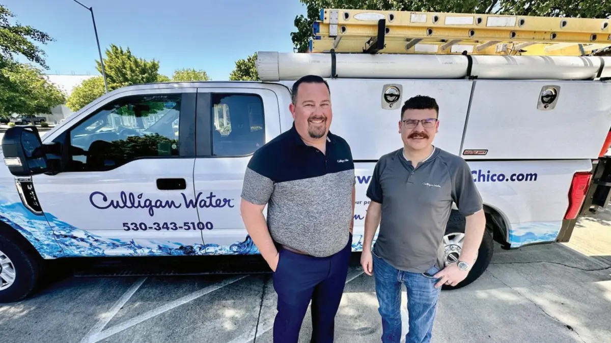Clay Farrell and William Bocast of Culligan of Chico in front of the company truck